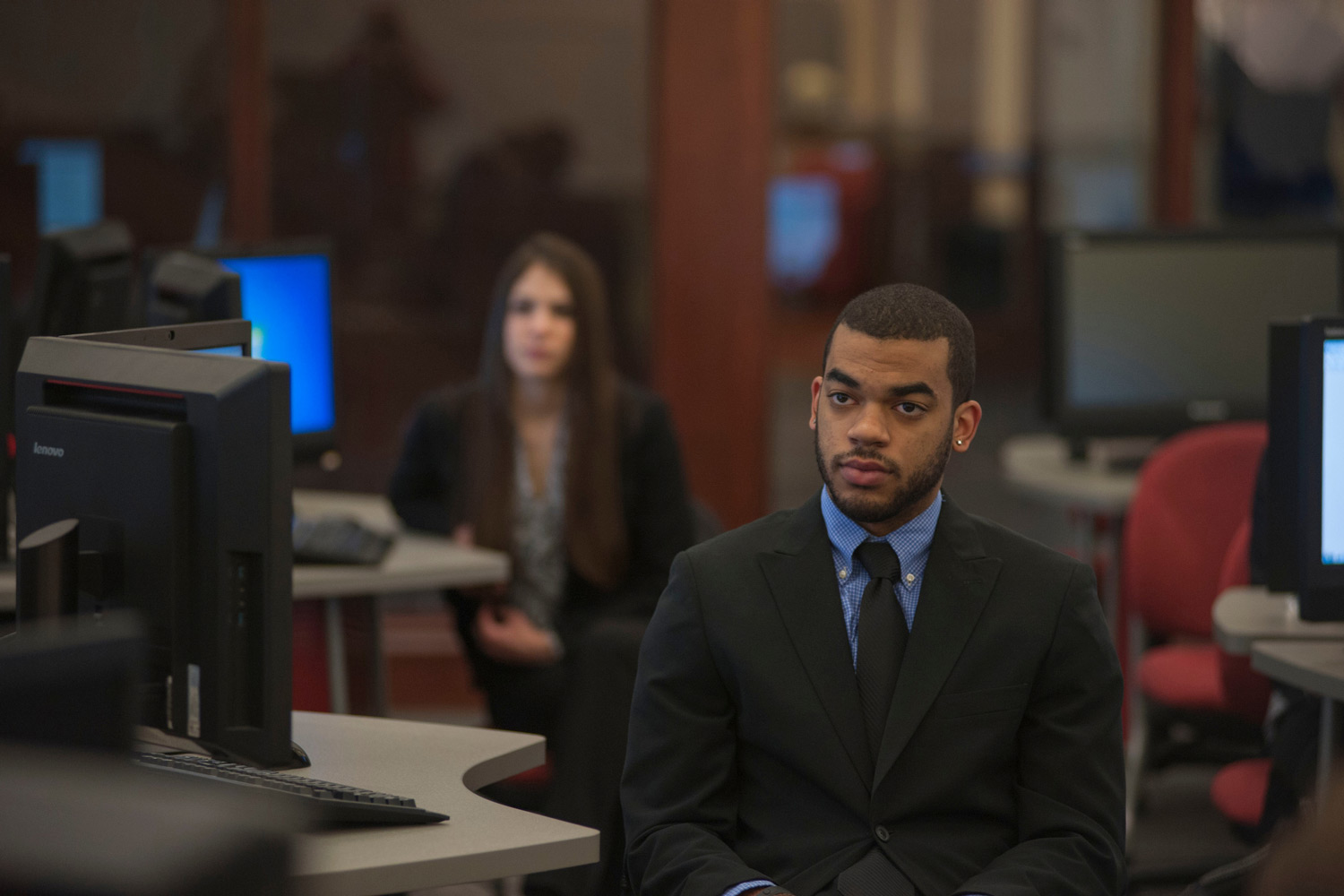 man in classroom in business attire