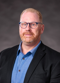 Headshot of Geoffrey Pollick