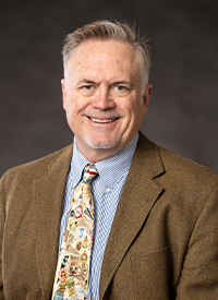 Headshot of John Travers