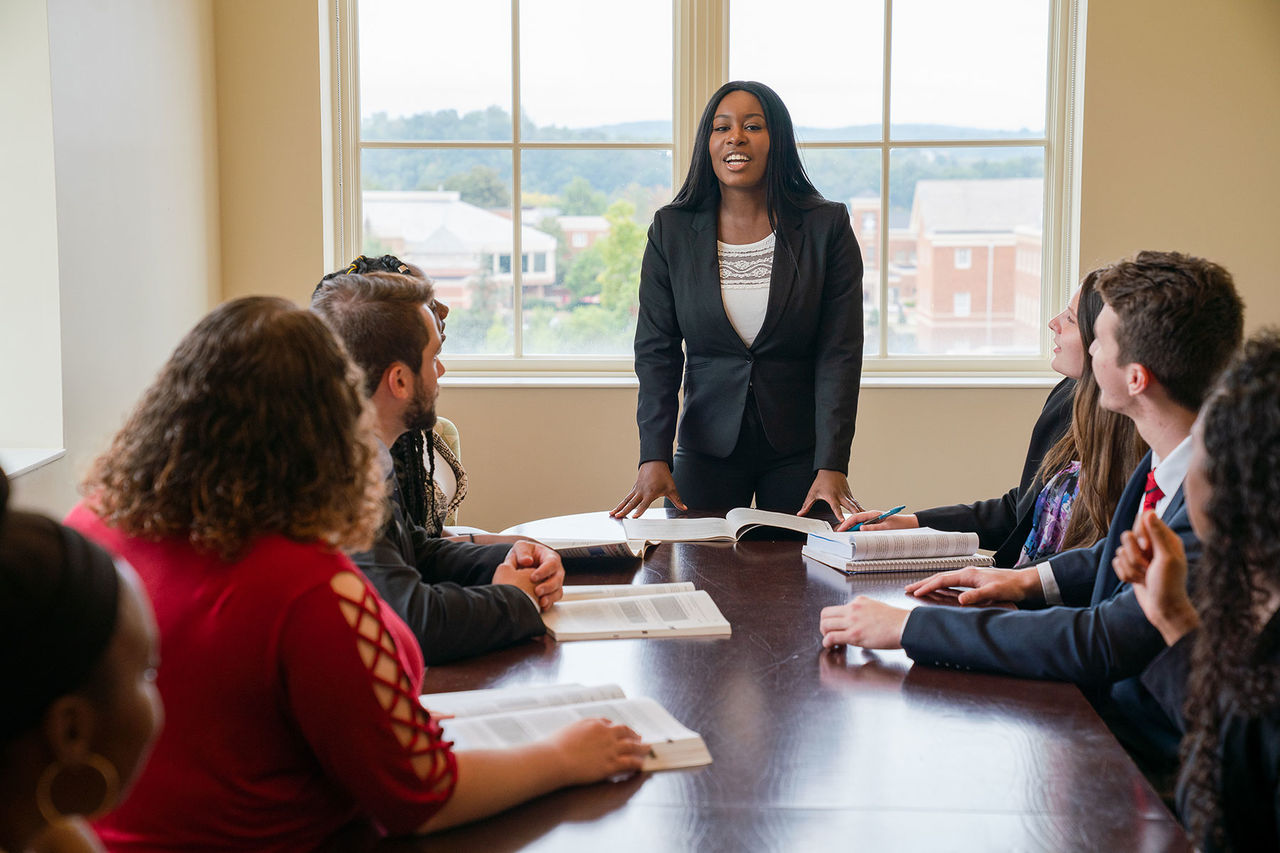 students in a boardroom