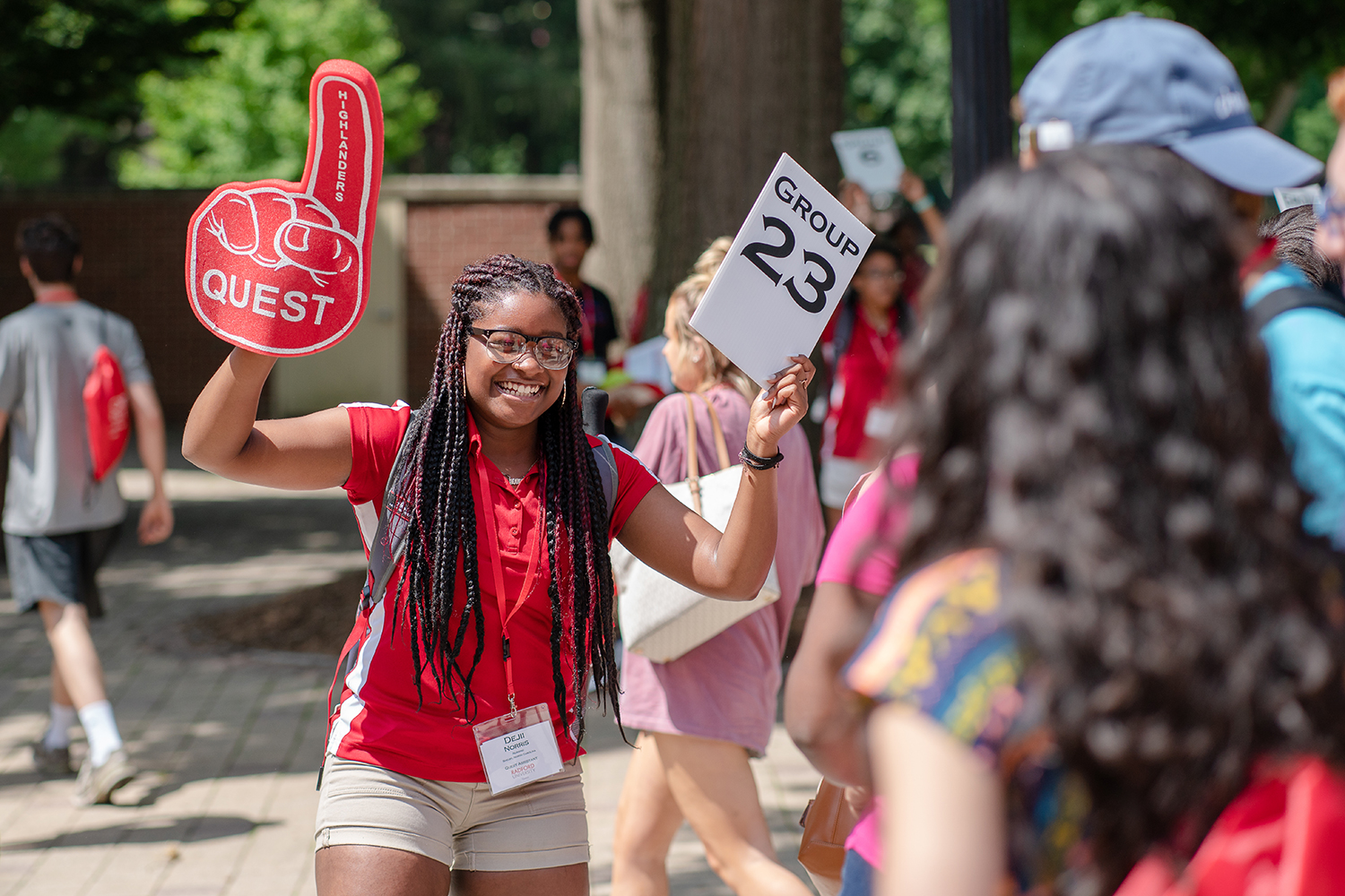 Excited Quest leader on campus.