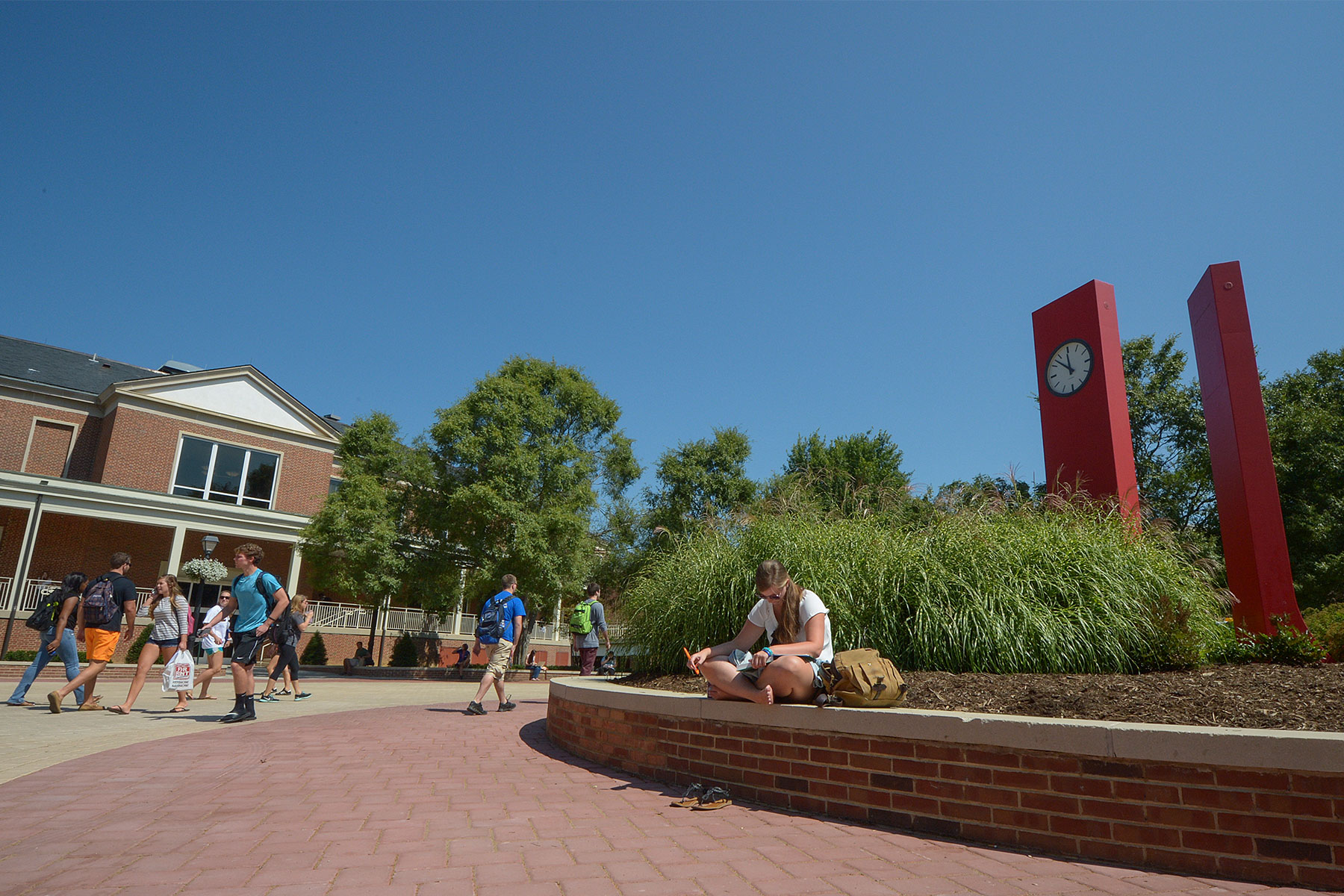 image of campus with students walking around in Radford VA