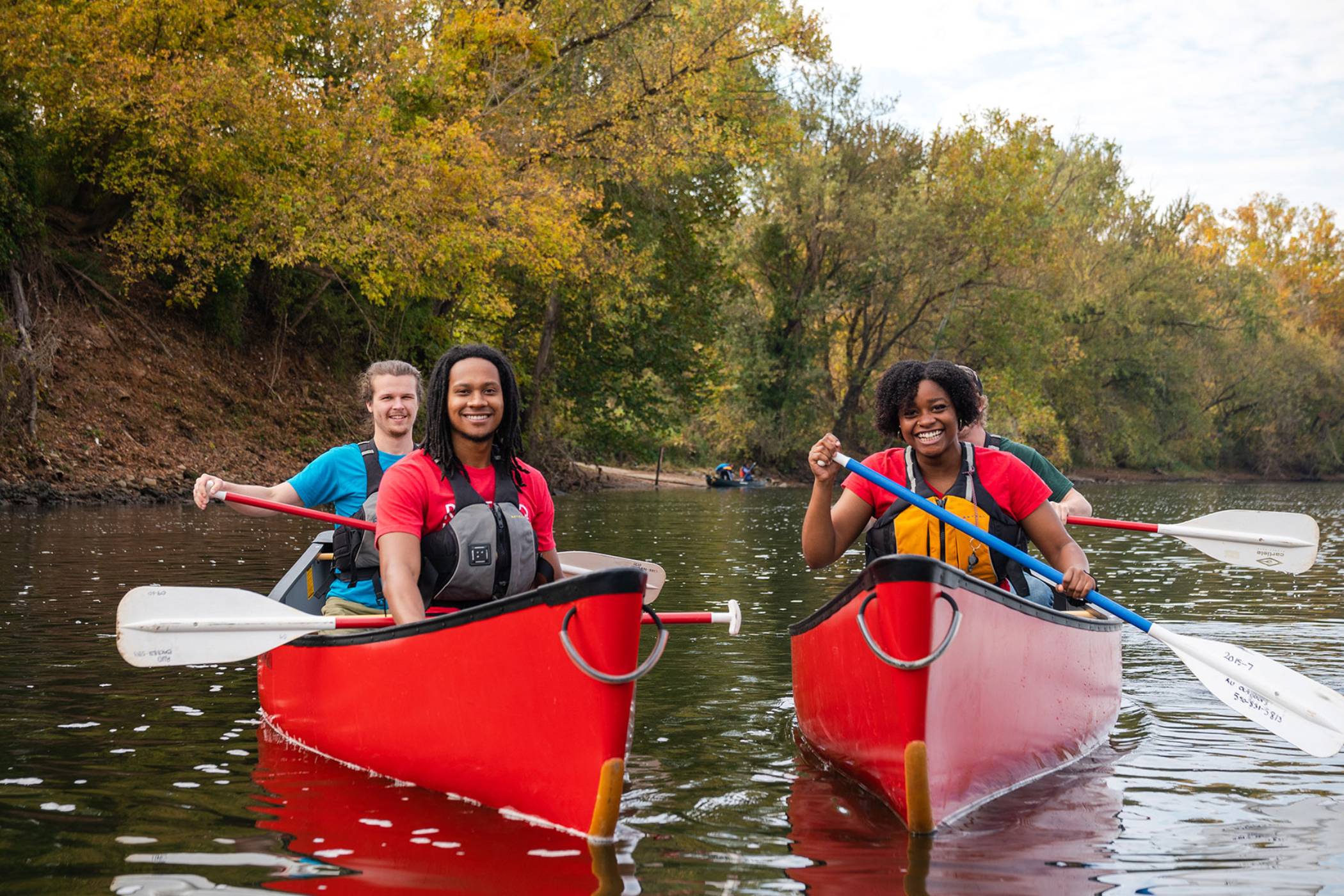 Student kayaking the New River. 